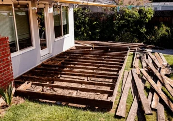 deconstructing-backyard-deck-removing-flooring-600nw-2480630433